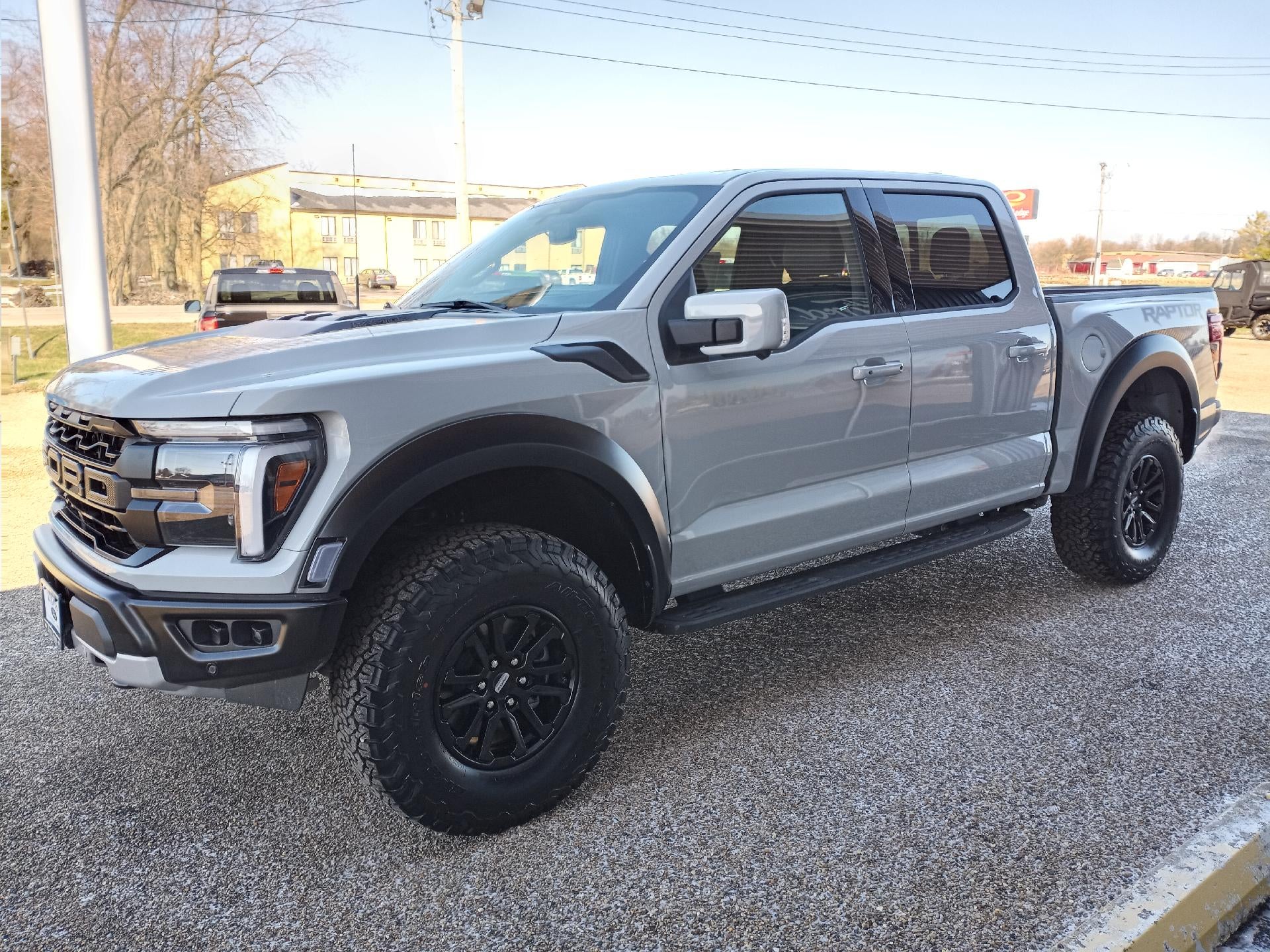2026 Ford F-150 Raptor 4WD SuperCrew 5.5' Box in Avalanche — front three-quarter view