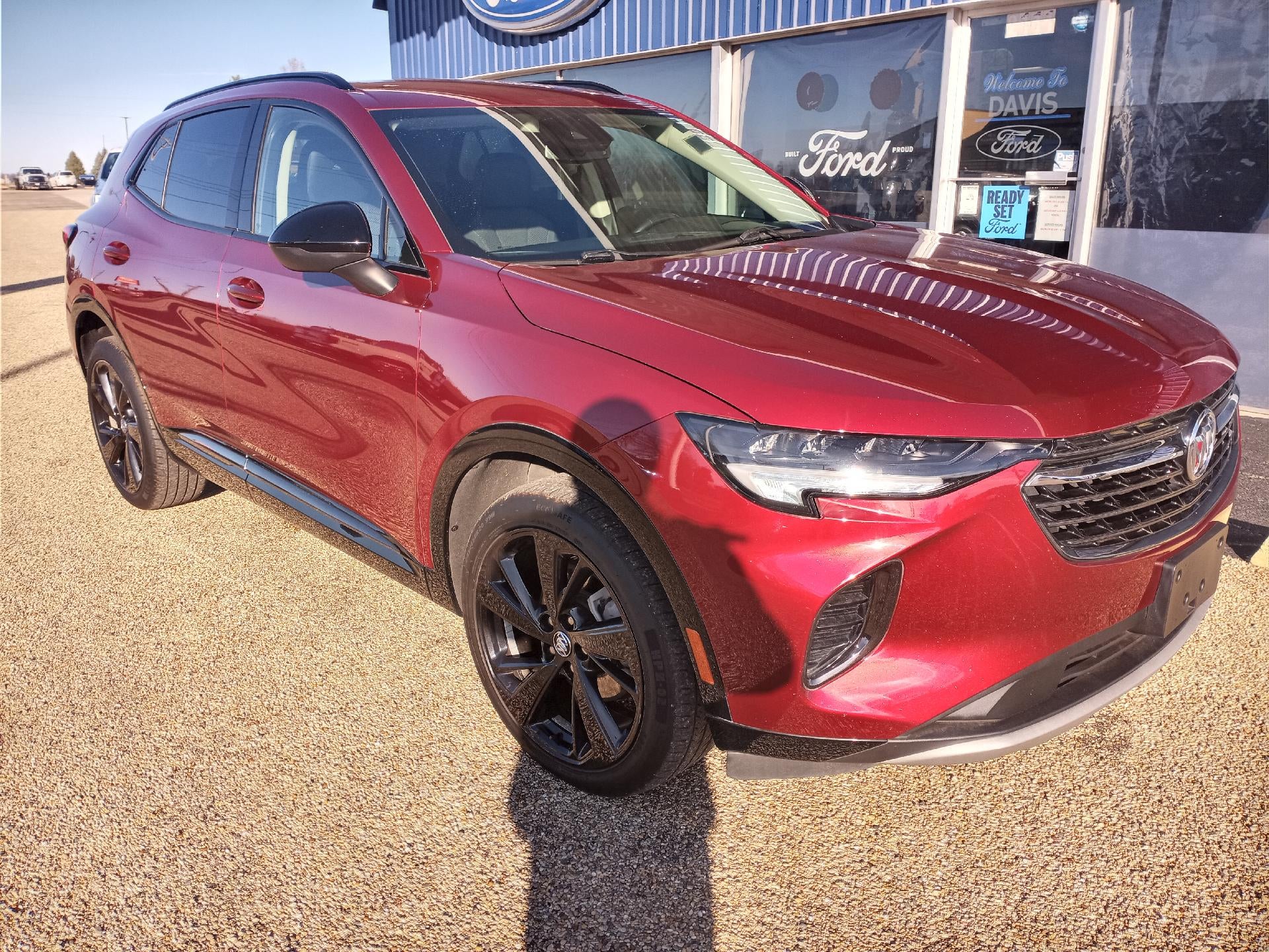 2023 Buick Envision FWD 4dr Preferred in Cinnabar Metallic — front three-quarter view